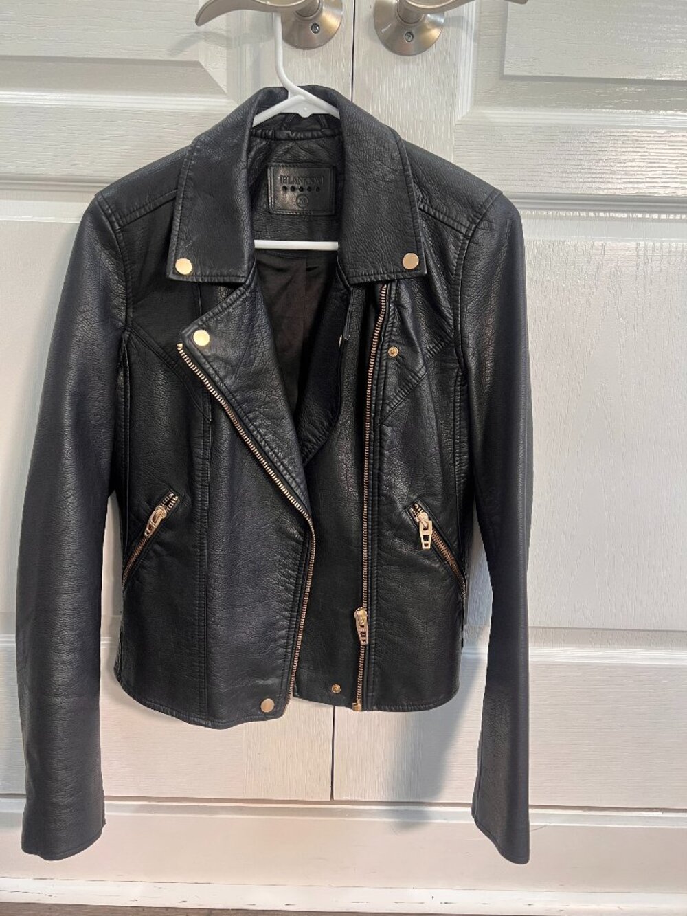 Faux leather moto jacket by BLANKNYC